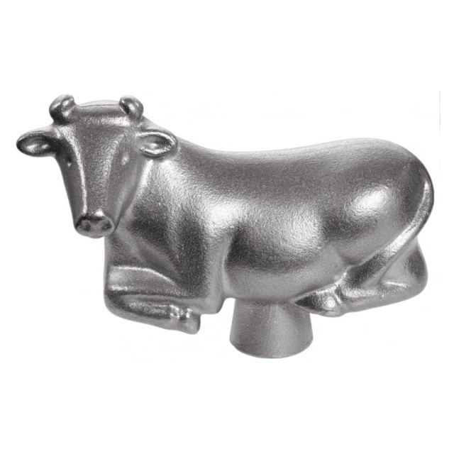 Metallinuppi Staub valurautapataan - eri hahmoja - Lehmä